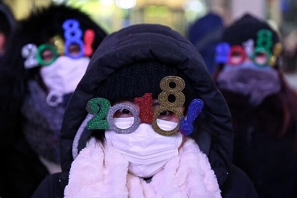 Revelers gather in Times Square ahead of the New Years Eve celebrations in New York