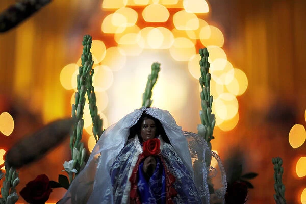 The statue of the virgin of Los Angeles known as Las Mariitas is seen after a