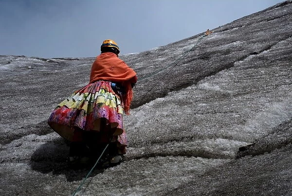 The Wider Image: Bolivias cholita climbers