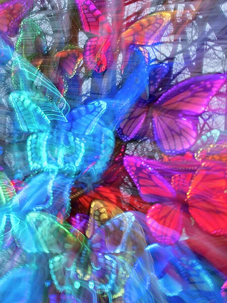 Arrangement of colorful artificial butterflies