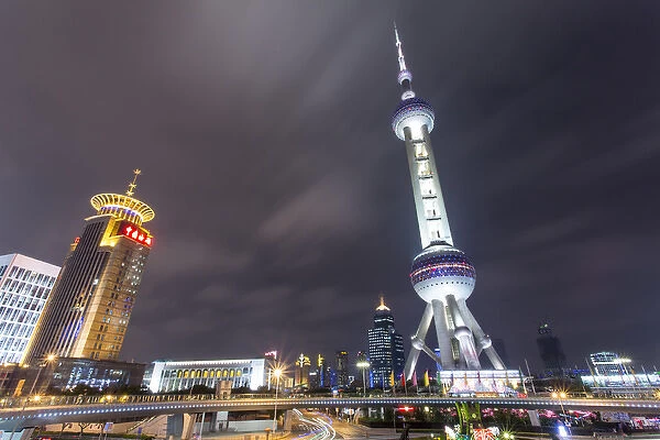 China, Shanghai, Oriental Pearl Radio & TV Tower rises 1, 535aa above traffic circle