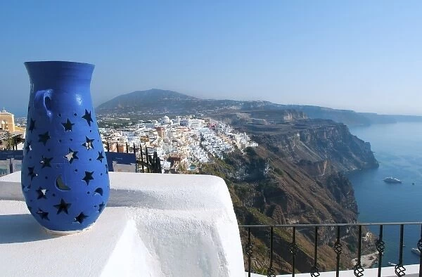 Peak of mountain with vase overlooking Fira at beautiful Santorini Greece in Greek