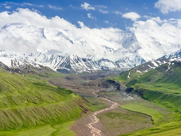 The peaks of Pik Kurumdy (6614 m) at the border triangle of Kyrgyzstan