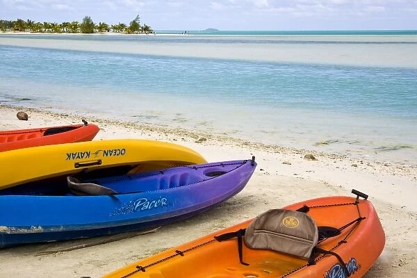 Polynesia, Cook Islands, Aitutaki. Colorful kayaks on the beach