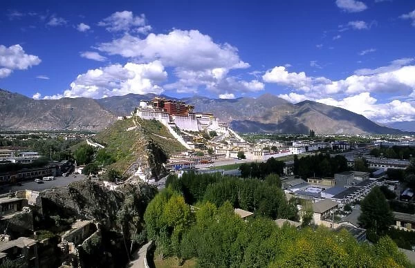 Potala Palace on mountain range from another mountain the home of the Dalai Lama