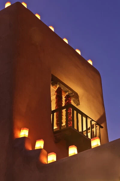 Santa Fe, New Mexico, United States. Tradional farolitos light up adobe structures