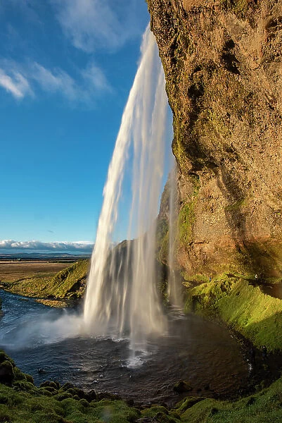 Seljalandsfoss Waterfall is a tourist icon in southern Iceland