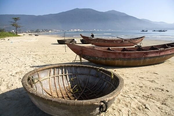 Woven boats and baskets on China Beach near the port city of Da Nang, Vietnam