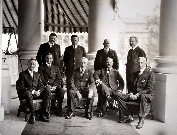 28th President of the United States. President Woodrow Wilson at the White House with some of his advisers, including Treasury Secretary William Gibbs McAdoo (front row, second from left); Bernard Baruch (front row, far right), and Herbert Hoover (back row, far left)