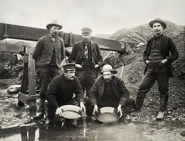 ALASKA GOLD RUSH, 1890s. Miners panning for gold in Alaska in the 1890s. Photograph
