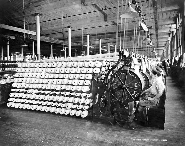 BOSTON: YARN FACTORY, c1912. Women working at machines, beaming and inspecting