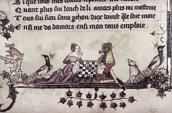 CHESS, 14th CENTURY. A game of chess. Beside the players sit two peacocks and a dog