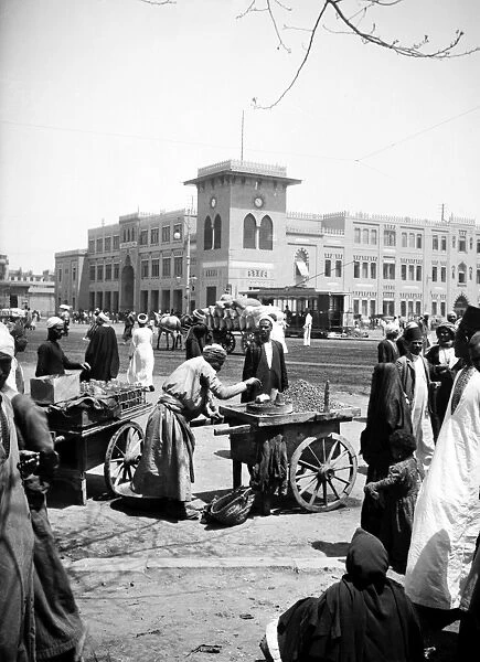 EGYPT: CAIRO. The railroad station in Cairo, Egypt, with vendors in the foreground