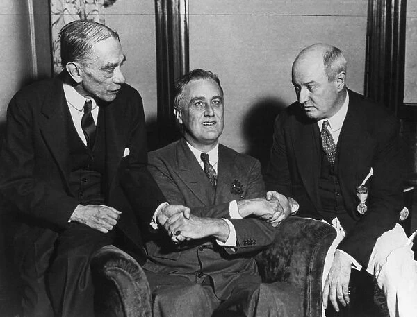 FRANKLIN D. ROOSEVELT (1882-1945). 32nd President of the United States. Joining hands with advisor Louis McHenry Howe (left) and campaing manager James A. Farley (right) in Chicago, Illinois, 3 July 1932, one day after accepting the presidential nomination of the Democratic Party