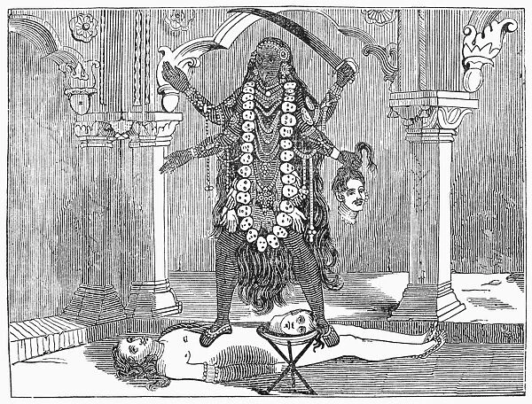 HINDU GODDESS: KALI. The Hindu goddess Kali, shown holding a bloody sword and the head of a giant while she tramples her consort, Shiva. Wood engraving, American, 1849