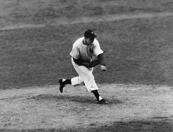 JOE PAGE (1917-1980). American baseball pitcher. Pitching the New York Yankees to victory over the Brooklyn Dodgers in the ninth inning of the seventh and deciding game of the 1947 World Series, at Yankee Stadium in the Bronx, New York City, 6 October 1947