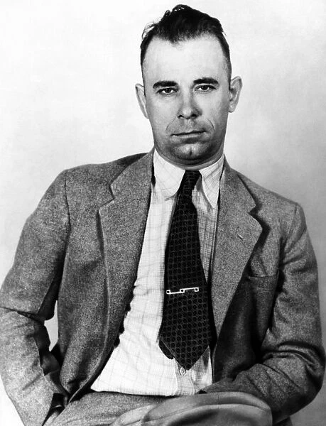 JOHN DILLINGER (1903-1934). American bank robber. Photographed in 1933