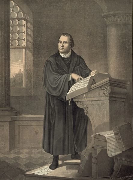 MARTIN LUTHER (1483-1546). German religious reformer. Luther at the pulpit, reading from a Bible