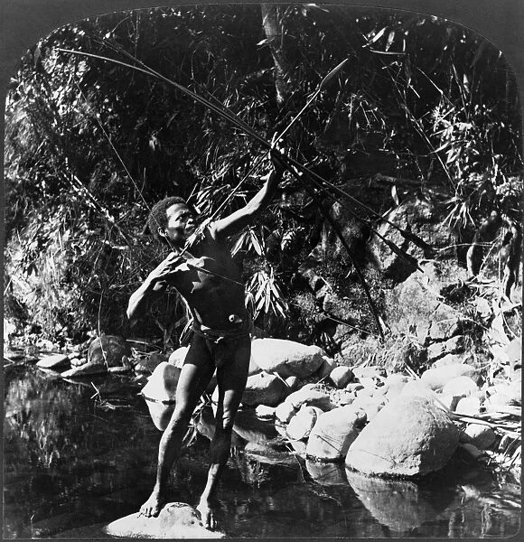 NATIVE HUNTER, c1907. A huntsman with his aboriginal war weapon, Philippine Islands