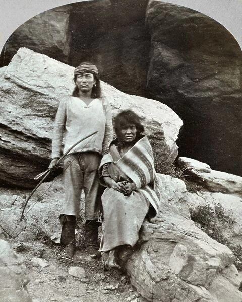 NAVAJOS, 1873. Young Navajo man and his mother. Photographed by Timothy O Sullivan, 1873