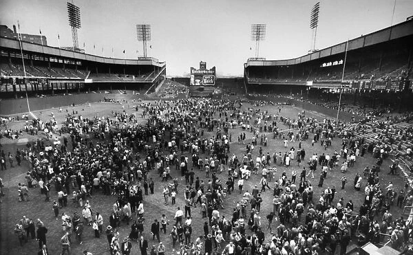 NEW YORK: POLO GROUNDS. Crowd of baseball fans pouring onto the field at the Polo Grounds in New York City after attending the New York Giants final game, a 9-1 loss to the Pittsburgh Pirates, 29 September 1957. The team would begin playing in San Francisco, California, the following season