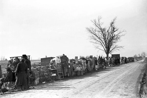 SHARECROPPERS, 1939. Evicted sharecroppers standing along Highway 60, New Madrid County, Missouri