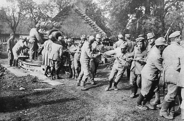 WWI: GERMAN ARTILLERY. German and Austrian artillery detachments pulling a Skoda