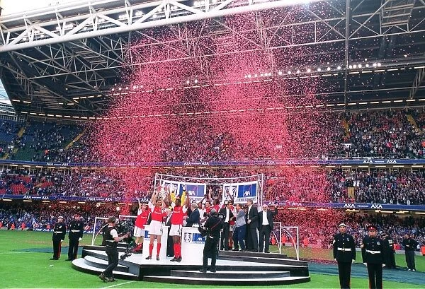 The Arsenal team celebrate after winning the FA Cup