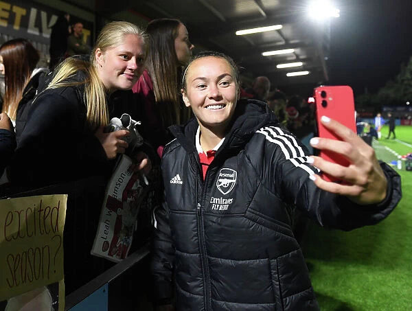 Arsenal Women's Team Celebrates with Fans After Victory Over Brighton in FA WSL