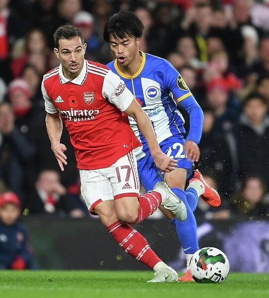Arsenal's Cedric Outruns Brighton's Mitoma in Carabao Cup Clash