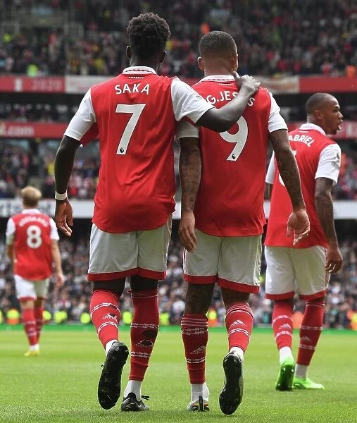 Arsenal's Gabriel Jesus and Bukayo Saka Celebrate Goals Against Tottenham in 2022-23 Premier League