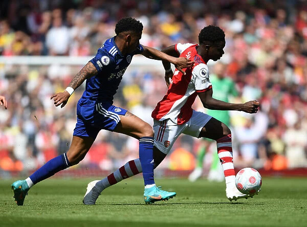 Saka's Skill Shines: Arsenal's Star Outmaneuvers Firpo in Premier League Clash