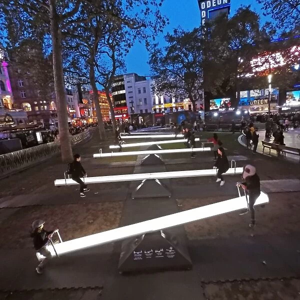 Impulse, a sea of singing seesaws installation, Leicester Square, London