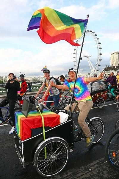 Rainbow flag and Ride with Pride bicycle ride for London Pride