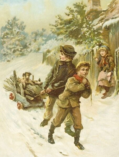 Two boys pulling a sledge through the snow