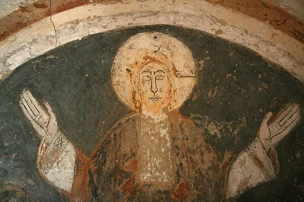 12th century Romanesque fresco depicting Jesus Christ in Saint Chef abbey church