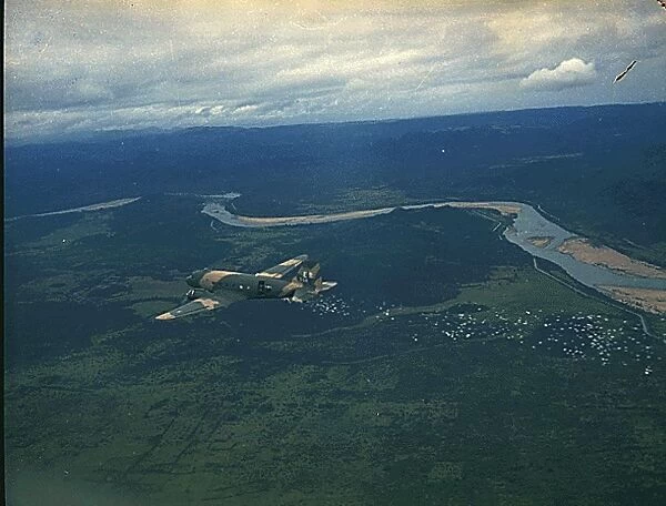 A US Air Force C-47 airplane releasing psychological warfare leaflets near Nha Trang, South Vietnam