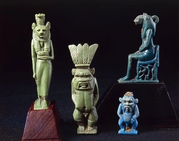 Amulets of deities Sekhmet and Bes, enamelled clay
