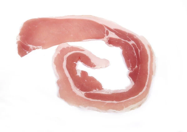Ayreshire bacon slice on white background, close-up