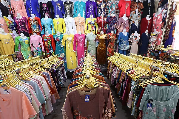 Ben Thanh Market. Ao Dai dress shop. Ho Chi Minh city. Vietnam