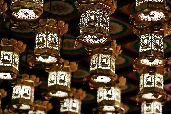 Buddha Tooth Relic Temple. Golden lanterns lining the ceiling. Singapore