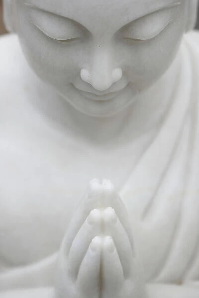 Buddhist monk praying. Marble sculpture. Danang. Vietnam