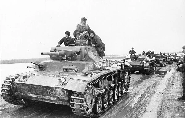 A column of tanks captured from the germans setting out after repairs to the front line april, 1942