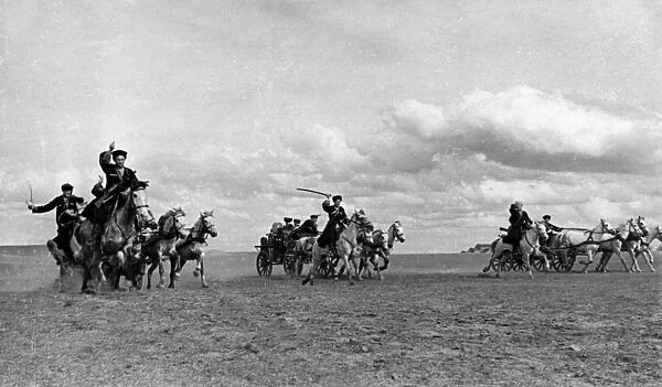 Cossack machine-gun carriages advancing to the firing lines during world war ll, may 1942