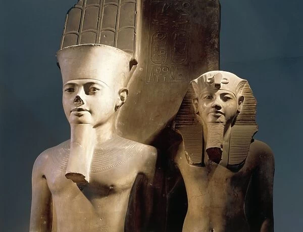 Egypt, Thebes, Detail of Statuary group representing Pharaoh Tutankhamun (or Tutankhamen, circa 1340-1323 B. C. ), seated on the throne, and Amun standing at his side, the royal names were substituted with the name of Horemheb, eighteenth dynasty