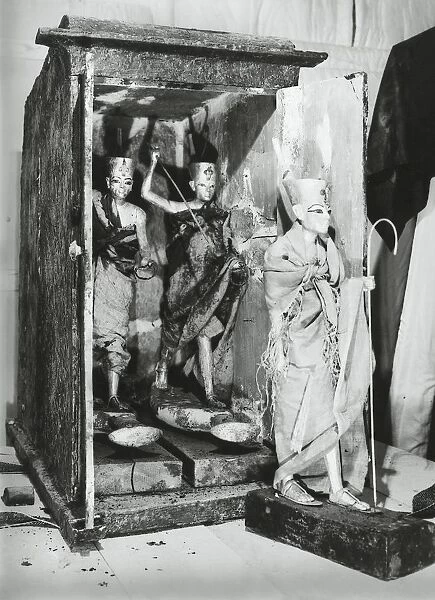 Egypt, Valley of the Kings, The discovery of the tomb of Pharaoh Tutankhamun (or Tutankhamen, circa 1340-1323 B. C. ), ritual statuettes in their cases, 1922, Vintage photograph