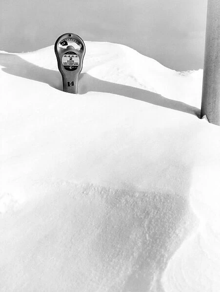 An Expired Parking Meter In The Snow