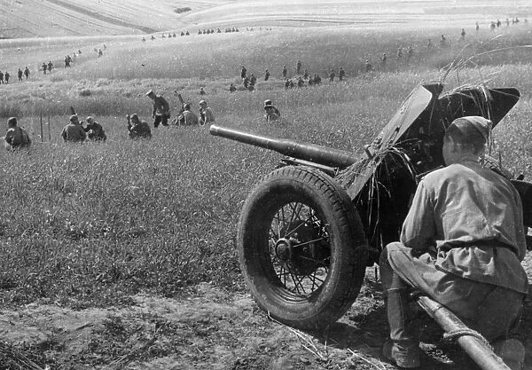 First ukranian front, an anti-tank gun supporting advancing soviet infantry