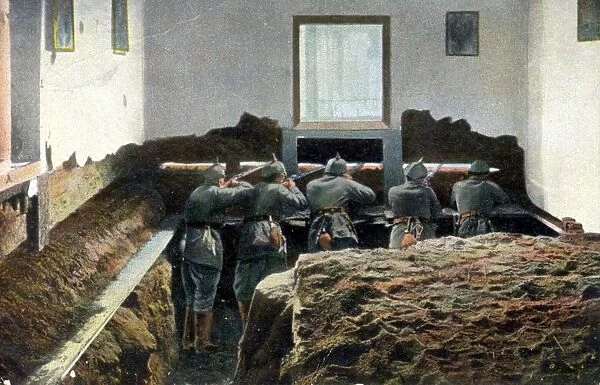 German soldiers in a defensive position in the front room of a house in urban street: World War I