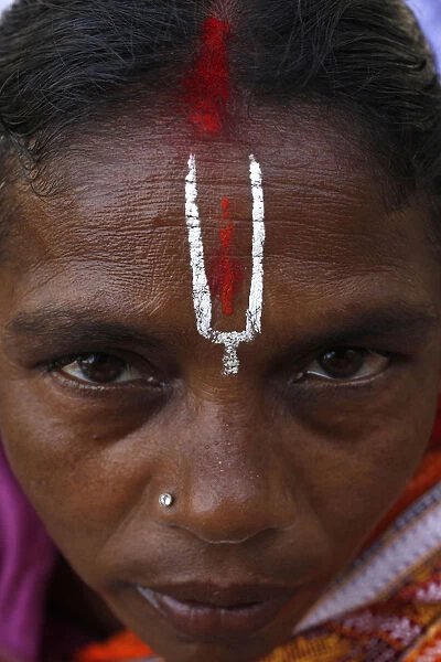 Hindu woman wearing the trident-shaped mark worn by the votaries of Vishnu